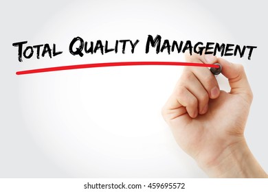 Hand writing Total Quality Management with marker, concept background - Shutterstock ID 459695572