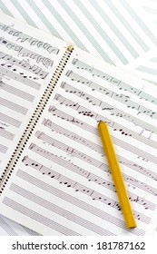 Hand Written Sheet Music And Wooden Pencil