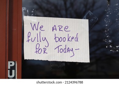 Hand Written Sign On The Door To A Business. We Are Fully Booked For Today. Good News For Any Business Owner. No Appointments Available.