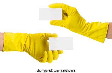 Hand In A Yellow Glove For Cleaning. A Set Of Hand Gestures Keeps The Business Card. Isolated White Background