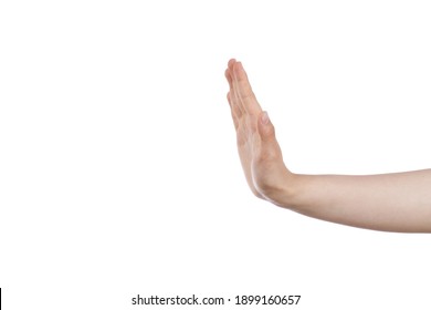
hand of a young caucasian teenage girl making a refusal sign on white isolated background