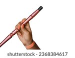 The hand of a young girl with a manicure holds a smoking object, a hookah pipe, on a white background isolated.