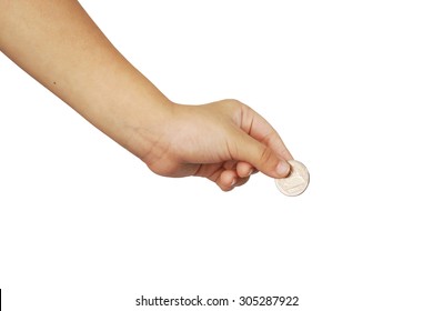 Hand Of A Young Kid Holding A Coin