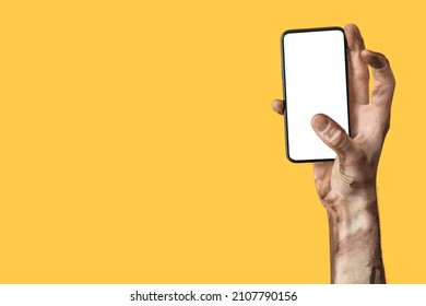 Hand Of Zombie With Mobile Phone On Color Background