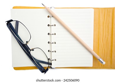 Handbook And Pencil For Older Person To Write Note