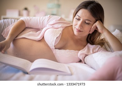 Handbook For Pregnant Women. Pregnant Woman Reading Book. 