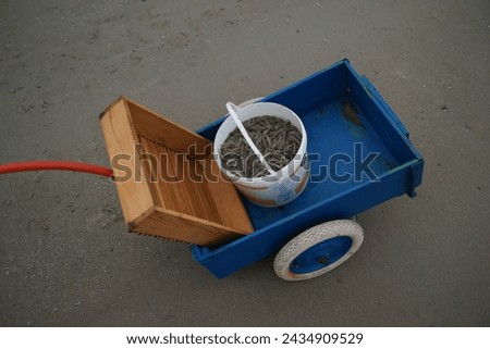 Handcart with crab catch North Sea

