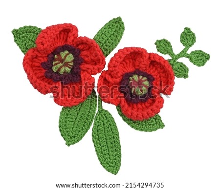 Handcrafted flowers of poppies and leaves isolated on a white background.
