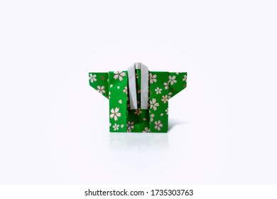 Handcrafted Isolated Japanese Green Kimono Paper Origami On White Background With Reflection