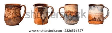 Handcrafted Pottery Mug isolated on white background.