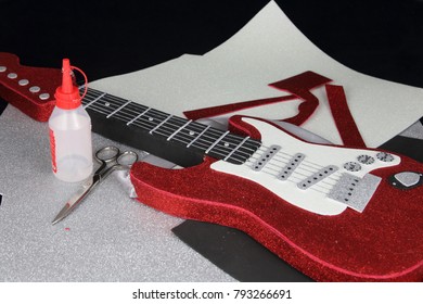 Handcrafted Red Rock Guitar Made Of Carton And EVA Glue And Scissors