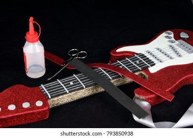 Handcrafted Red Rock Guitar Made Of Carton And EVA Glue And Scissors