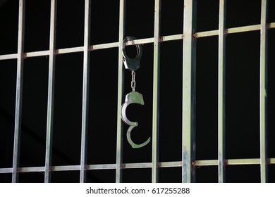 handcuff in jail with copyspace
