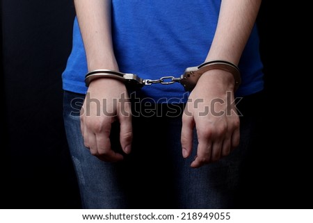 handcuffed hands