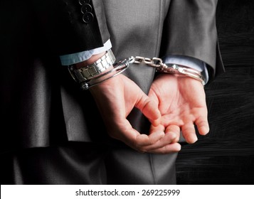 Handcuffs, Arrest, White Collar Crime.