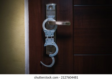 Handcuffs Hanging On The Door