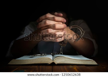 Handcuffs and the Holy Bible. Concept Picture of Someone Who Released From Sin by the God Words.