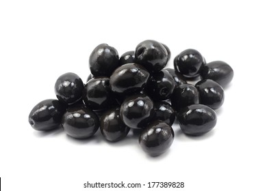 A Handful Of Black Olives On White Background