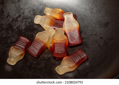 Handful Of Cola Bottle Shaped Gelatine Candy