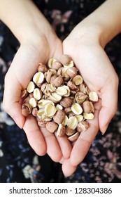 A handful of dried lotus seeds