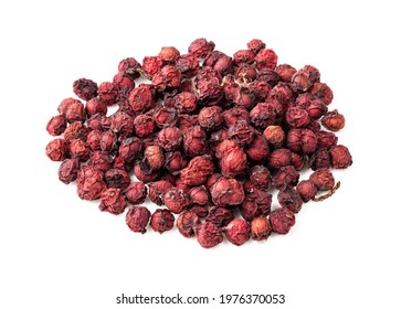 Handful Of Dried Magnolia Berries (Schisandra Chinensis Seeds) Closeup On White Background