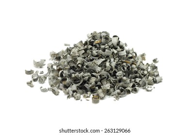 a handful of gray oak sawdust on a white background - Shutterstock ID 263129066