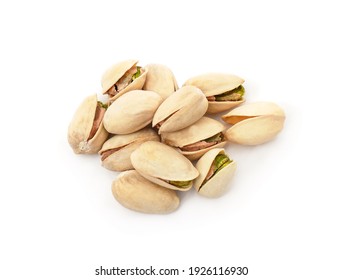 A handful of green pistachios isolated on a white background.