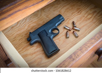 Handgun In Bedroom Dresser Drawer