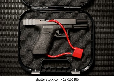 Handgun In Case With Cable Lock