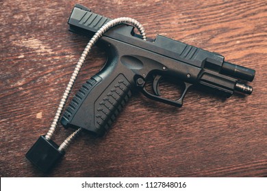 Handgun With Chamber Lock Showing Gun Safety