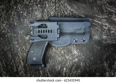 Handgun In Holster