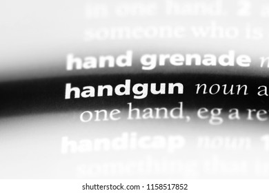 handgun word in a dictionary. handgun concept. - Shutterstock ID 1158517852