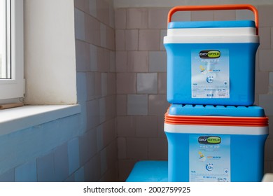 Handheld Refrigerators With Covid-19 Vaccine In A Medical Distribution Warehouse. March 2, 2021, Balti Moldova, Illustrative Editorial. Selective Focus.