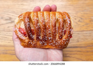 Handheld Strawberry And Cream Cheese Danish