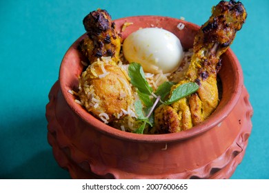 Handi Chicken Biryani With Egg  Potato Kolkata Style