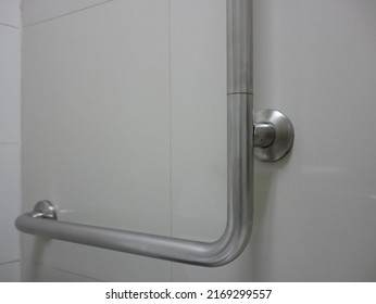 Handicap Handle For Security In Public Toilet.	