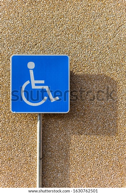 handicap parking spot at shop sunny day space\
for text accessible