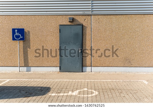 handicap parking spot at shop sunny day space
for text accessible