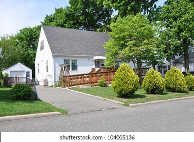 Handicap Ramp Middle Class Suburban Cape Cod Home In Residential Neighborhood