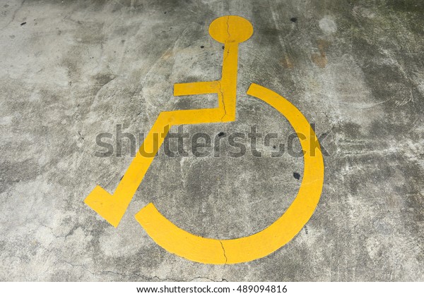 Handicap road sign Parking\
spots
