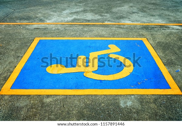 Handicap Sign on Parking\
Ground.