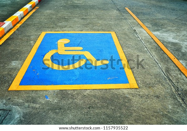 Handicap Sign on Parking\
Ground.