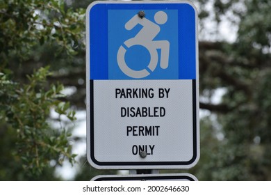 Handicapped Parking By Permit Only Sign.