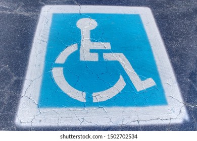 Handicapped Parking Logo On Concrete