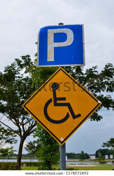Handicapped parking lot on the\
garden.
