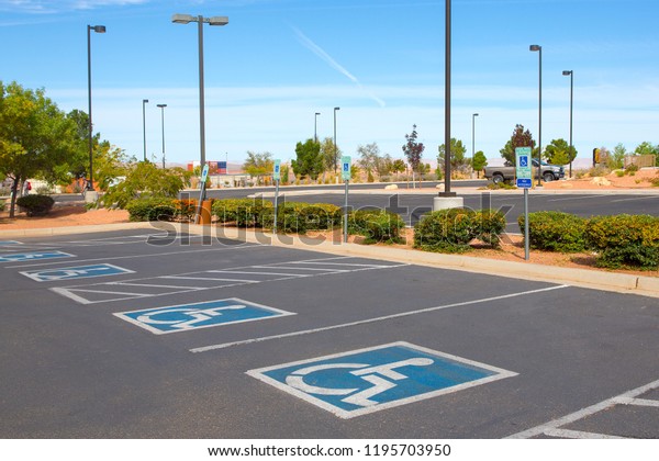 Handicapped parking spot in department\
store, transportation infrastructure road\
markings.