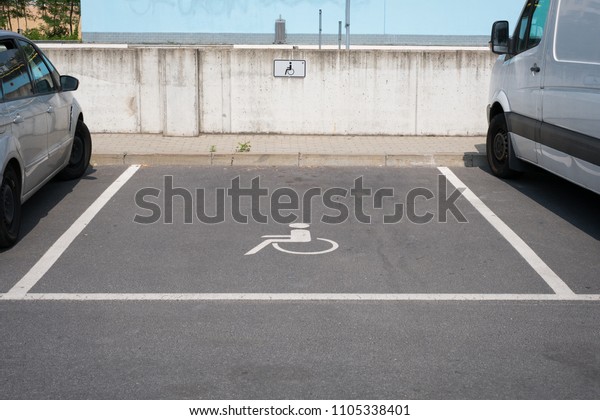 handicapped parking\
spot with wheelchair symbol\
-