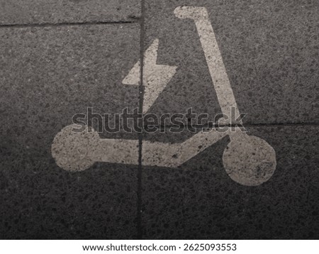 Handicapped Parking Symbol Painted on Asphalt Surface in Public Parking Area for Disabled Accessibility