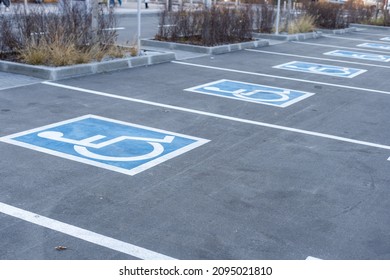 Handicapped Symbol Painted On A Parking Spot