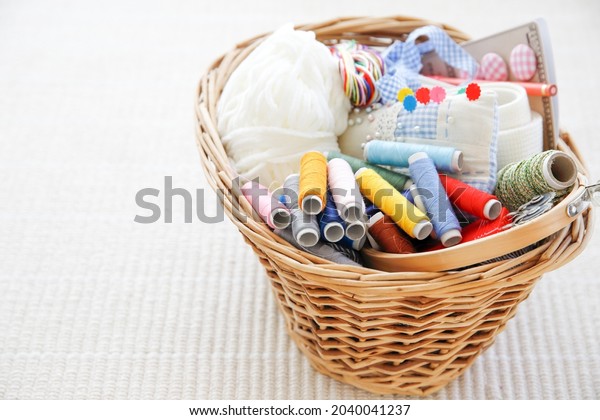 Handicraft supplies stored in\
a basket